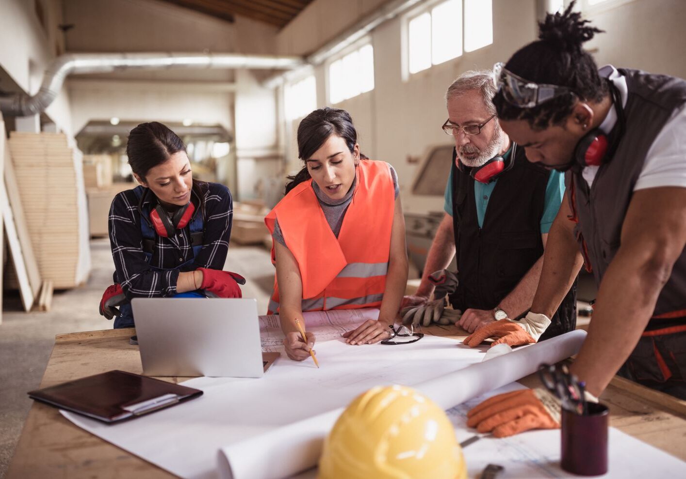 team of contractors discussing home renovation